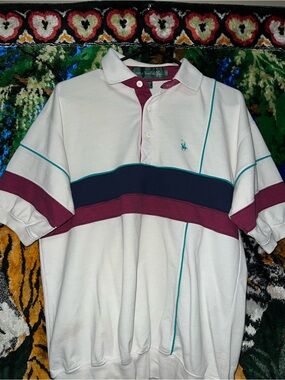 Retro medium knights of round table polo has small stain